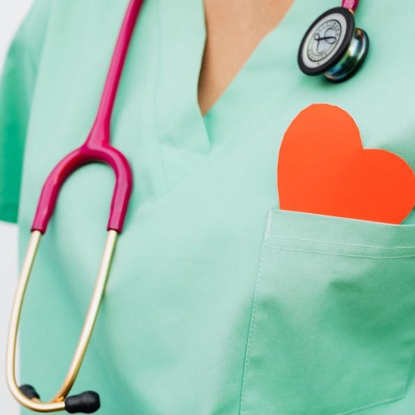 A healthcare professional with a stethoscope and red heart symbol emphasizes cardiology care.